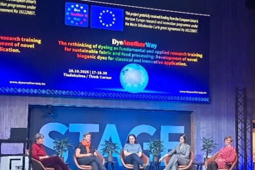 Five persons sitting at a panel discussion at the Kick-off meeting in Helsinki
